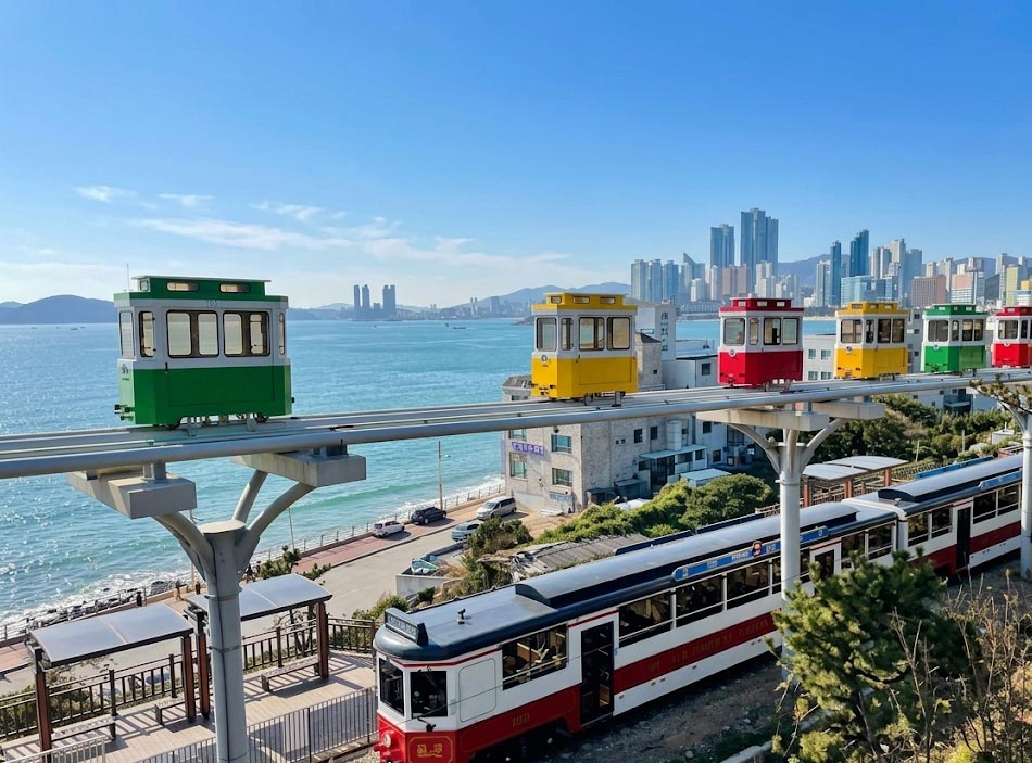 Romantic Coastal Ride: Haeundae Blueline Park Beach Train in Busan